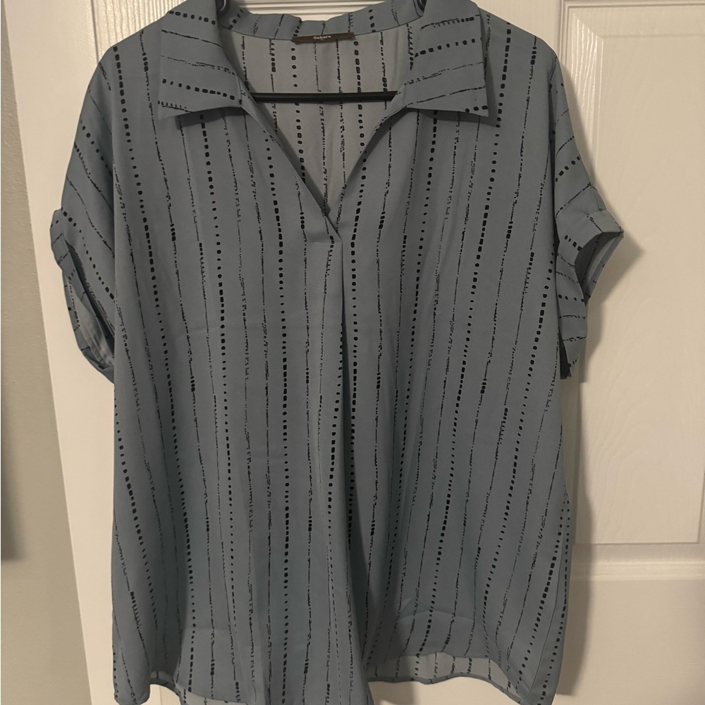 Blue and black spotted collared work blouse.